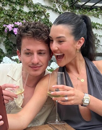 Charlie Puth with his fiancee.